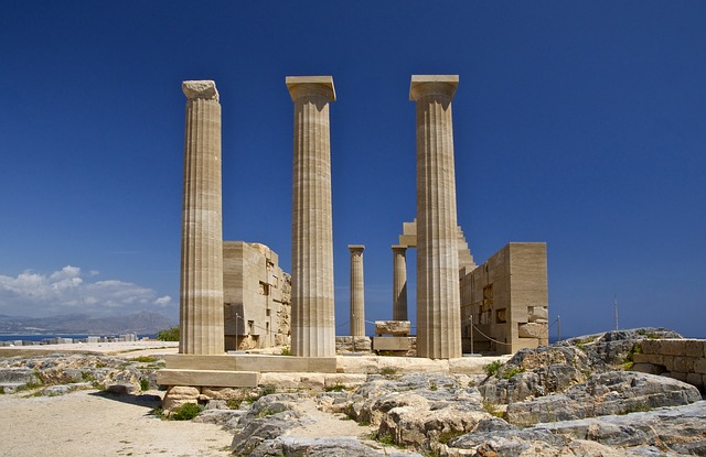 A group of four pillars in the middle of an area.