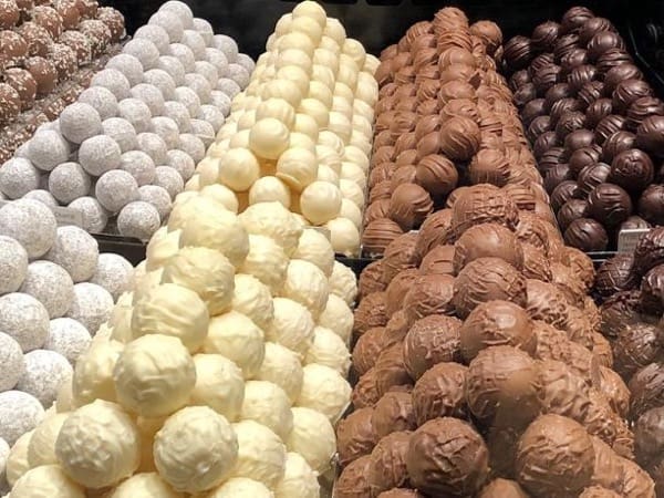 A close up of many different types of chocolates