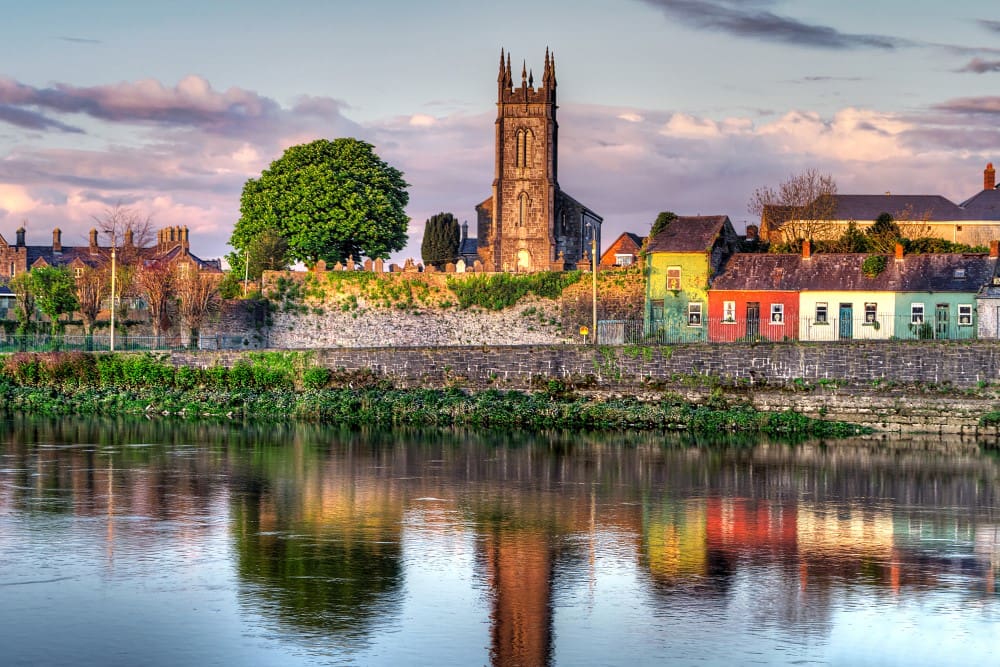 A view of the river and buildings in front of it.