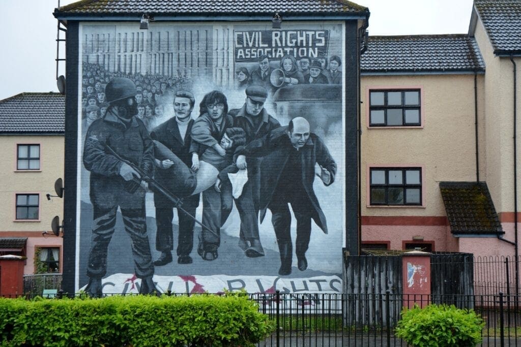 A mural of the civil rights association in front of a building.