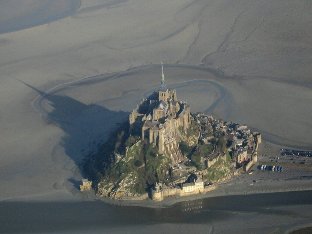 A large island with a castle on top of it.