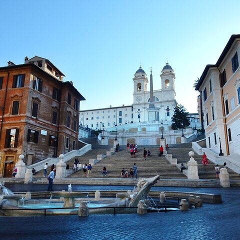 A group of people walking up and down steps.